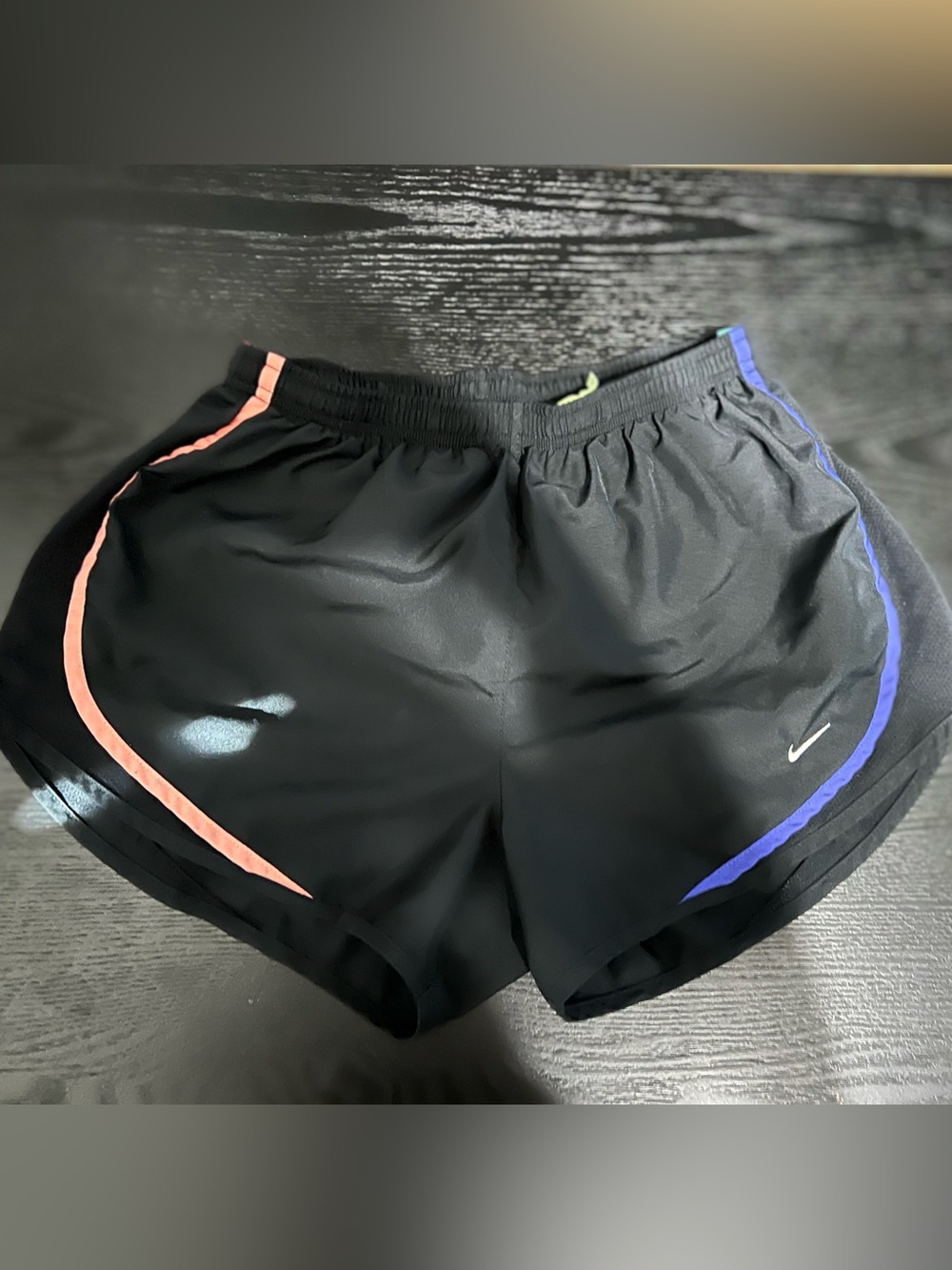 A pair of Nike Black Athletic-Rebook Shorts with Colorful Pink, Blue, Purple